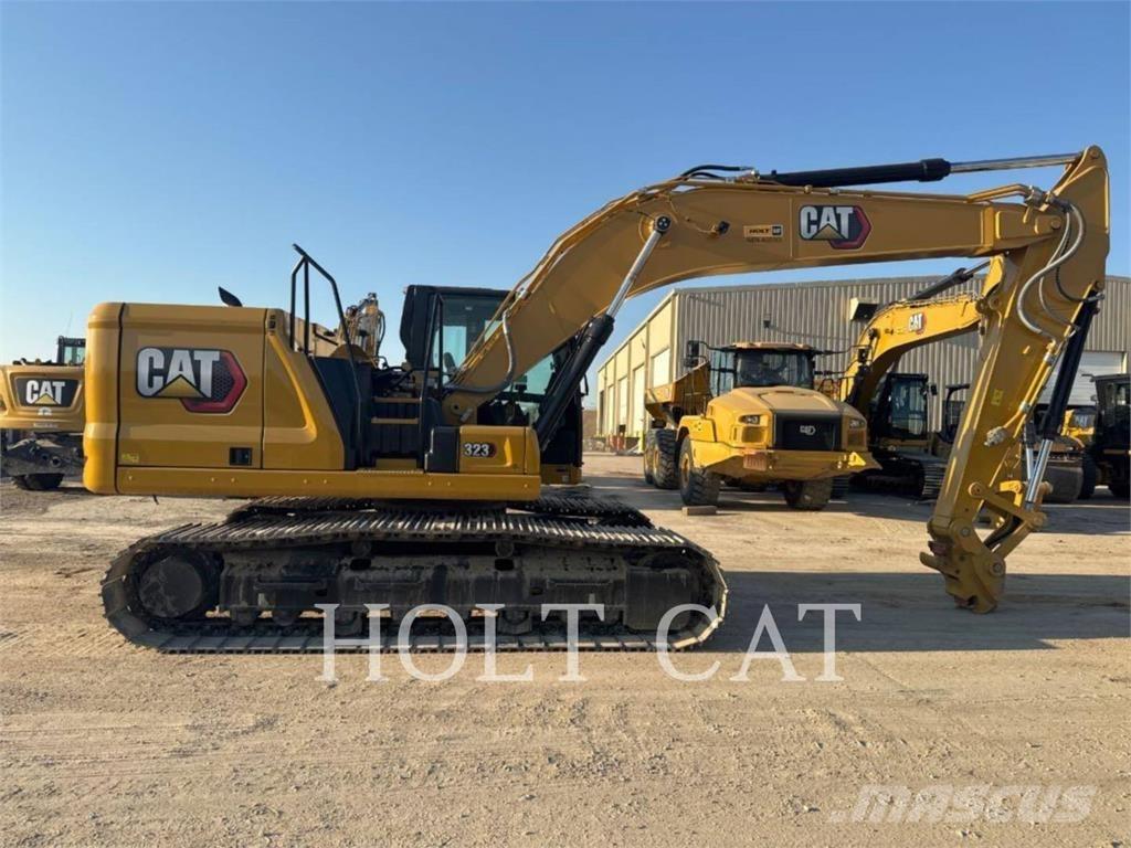CAT 323 TC Incarcator pe pneuri