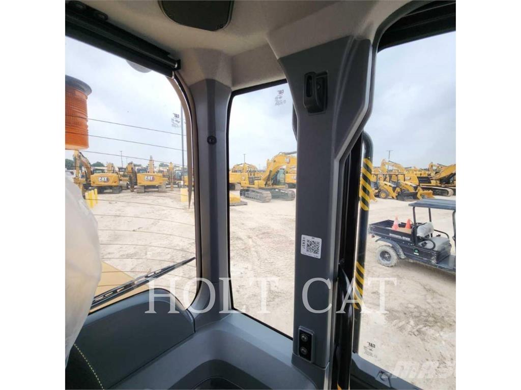 CAT 938 QC Incarcator pe pneuri