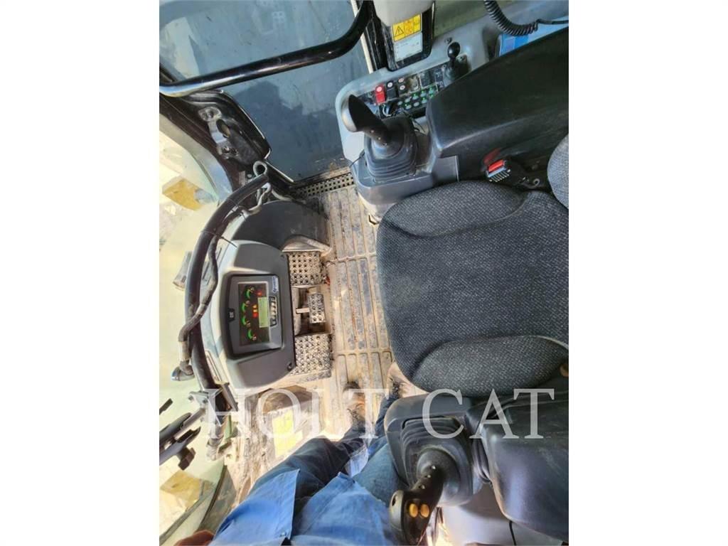 CAT 973K Încarcatoare cu excavator