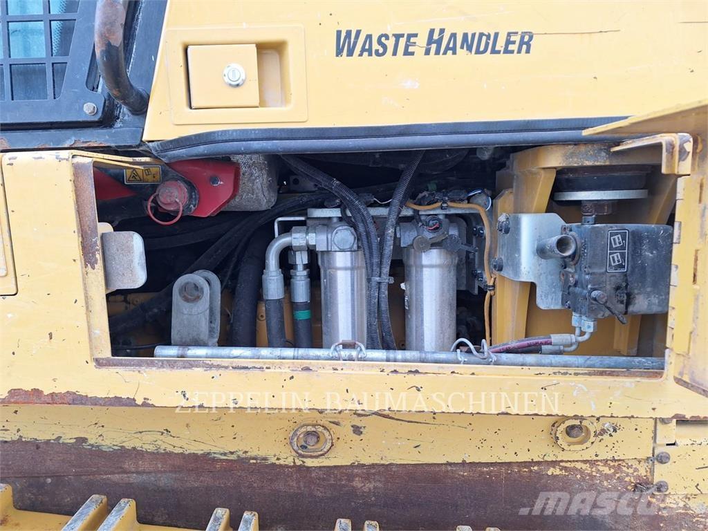 CAT 973K Încarcatoare cu excavator