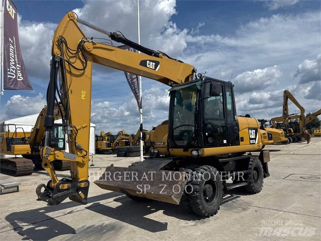 CAT M313D Excavatoare cu roti