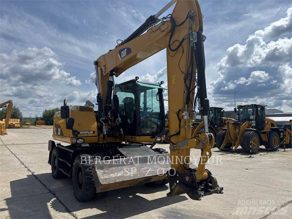 CAT M313D Excavatoare cu roti