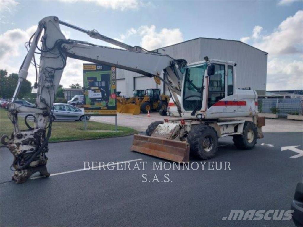 CAT M313D Excavatoare cu roti