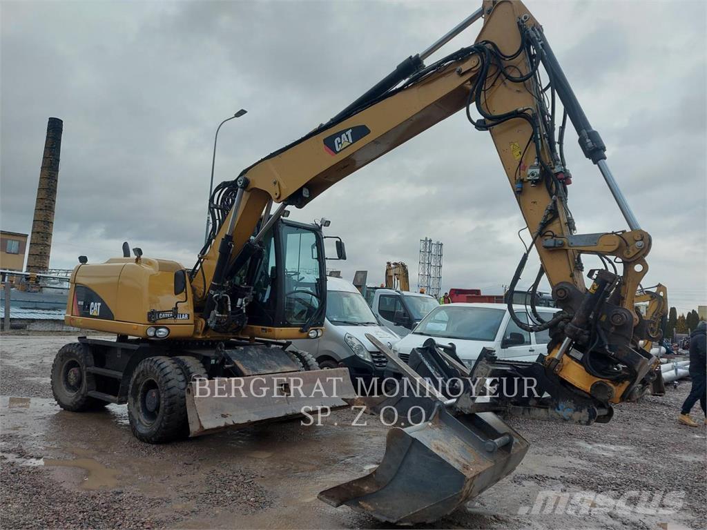 CAT M313D Excavatoare cu roti