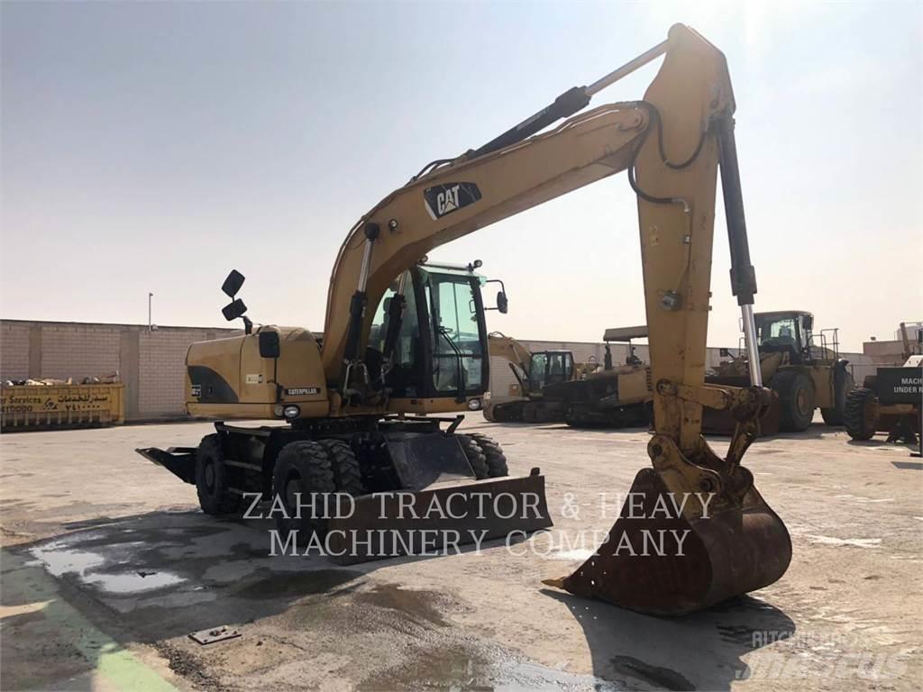 CAT M317D Excavatoare cu roti