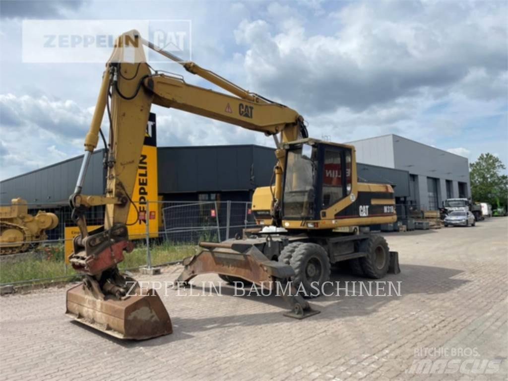 CAT M318 Excavatoare cu roti