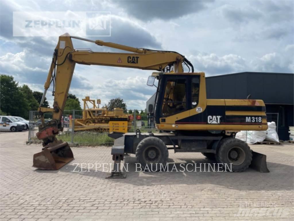 CAT M318 Excavatoare cu roti