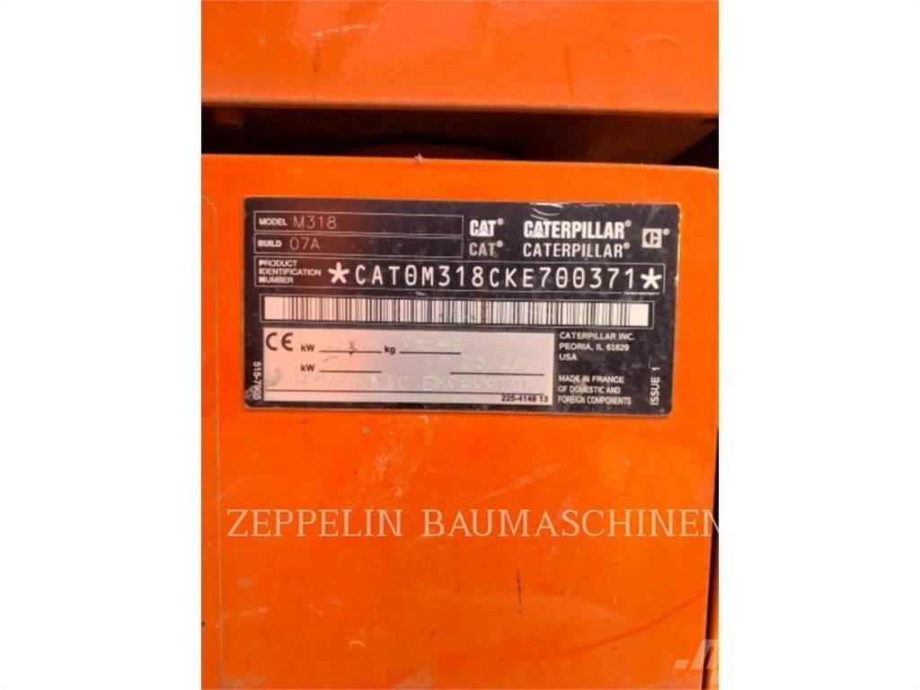 CAT M318-07A Excavatoare cu roti