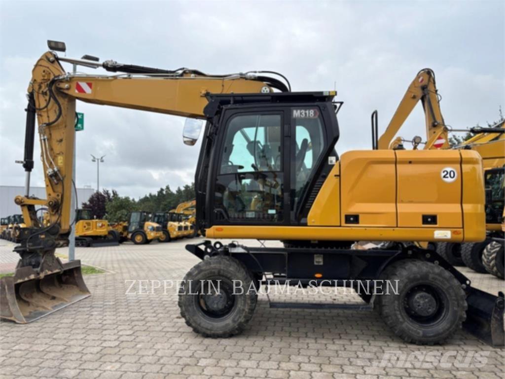 CAT M318-07A Excavatoare cu roti
