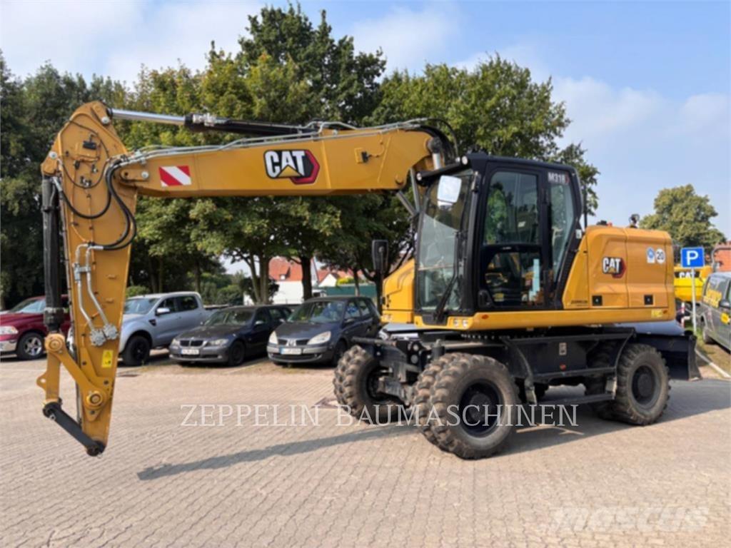 CAT M318-07A Excavatoare cu roti