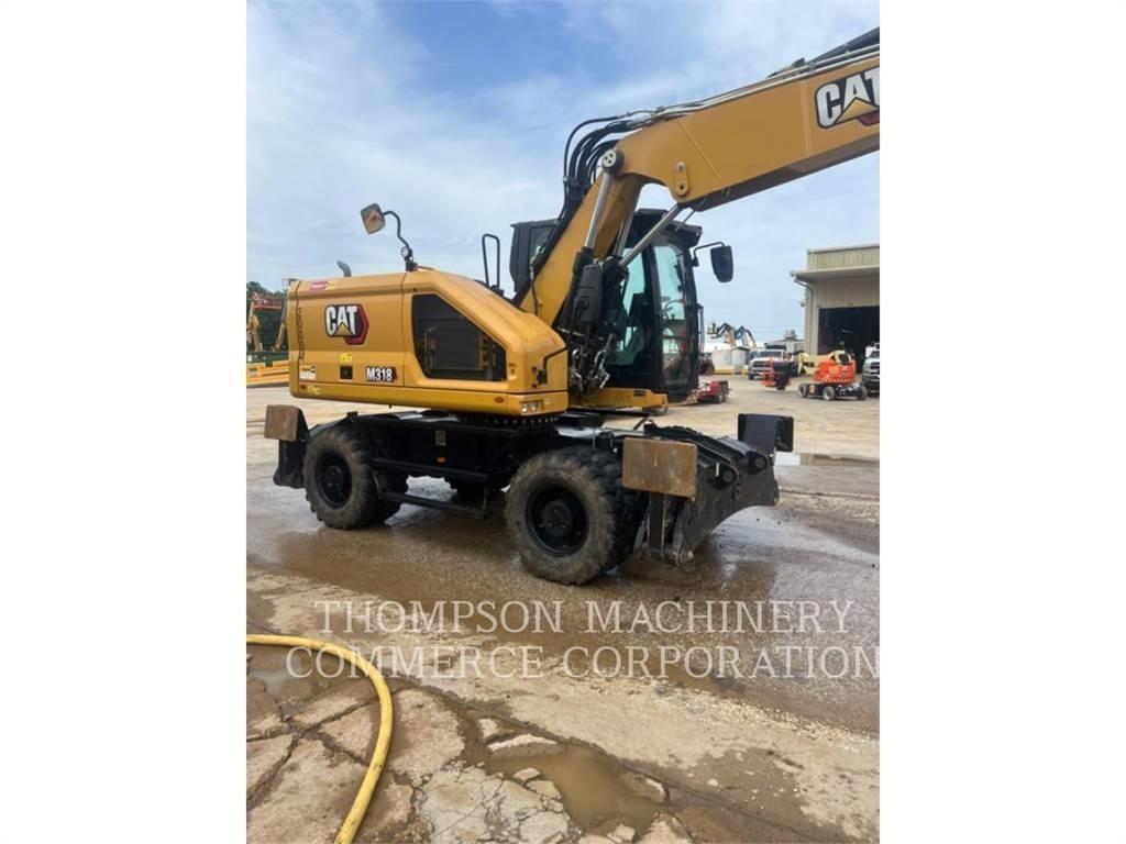 CAT M31807 Excavatoare cu roti
