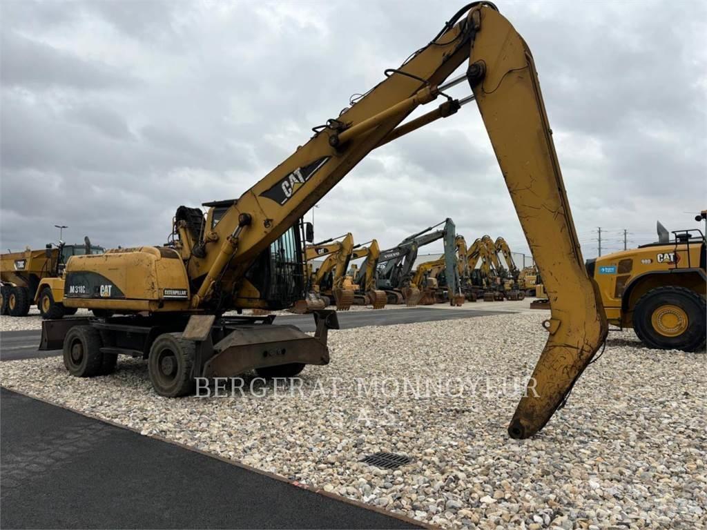 CAT M318C Excavatoare cu roti