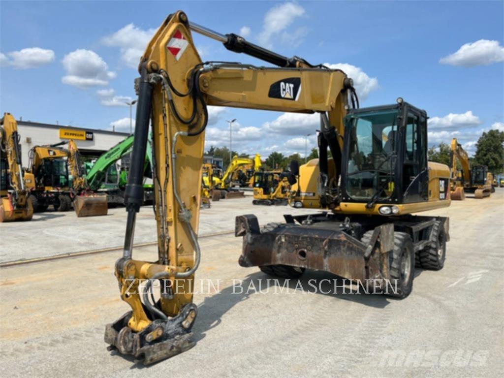 CAT M318D Excavatoare cu roti