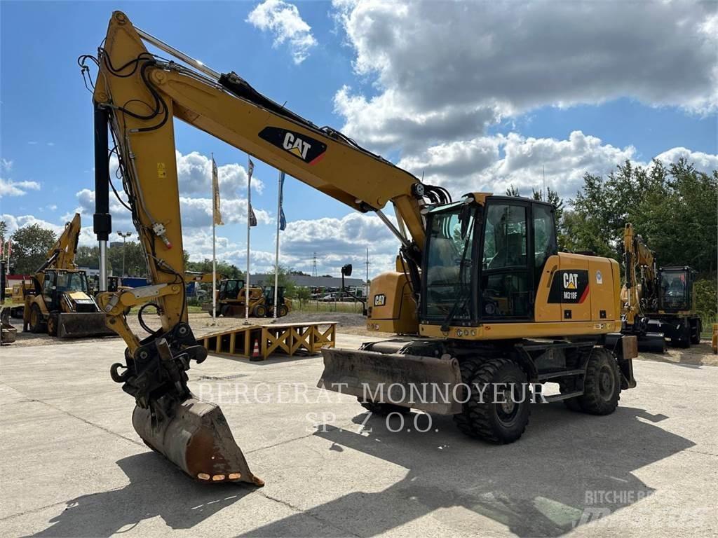 CAT M318F Excavatoare cu roti