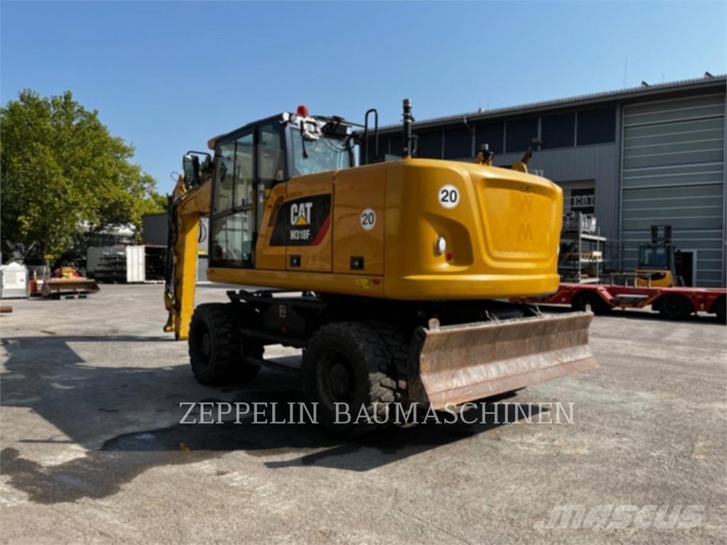 CAT M318F Excavatoare cu roti