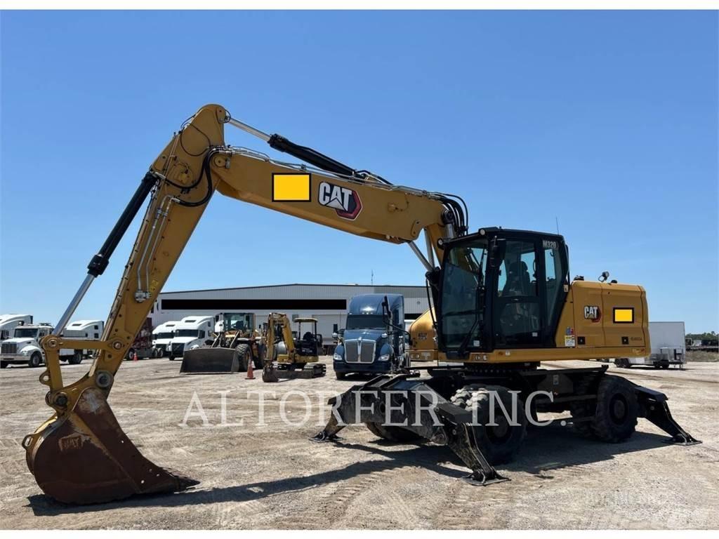 CAT M320 Excavatoare cu roti