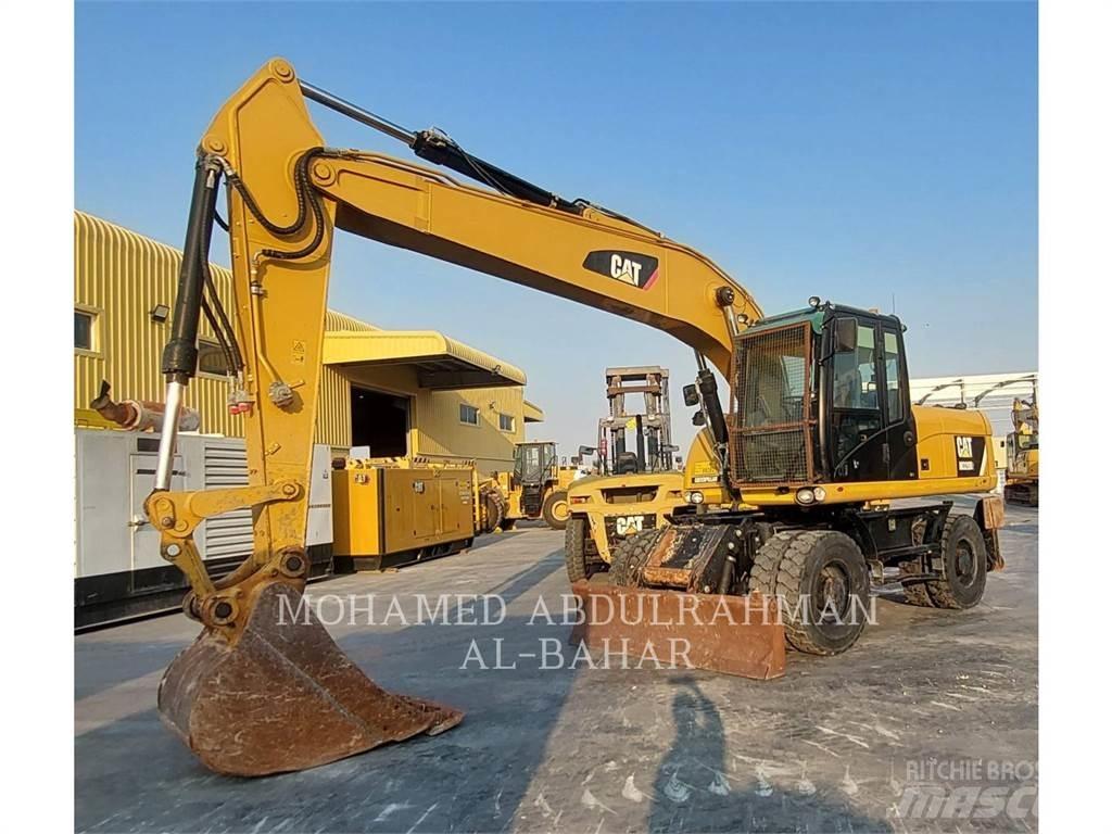 CAT M320D2 Excavatoare cu roti