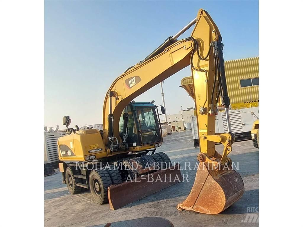 CAT M320D2 Excavatoare cu roti