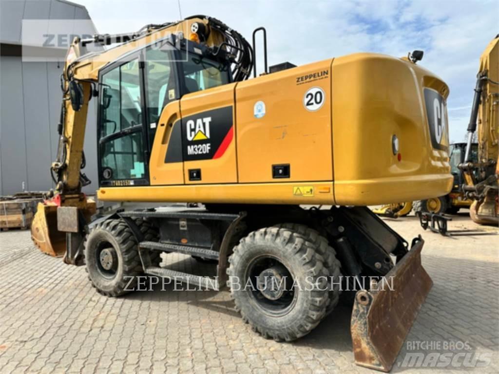 CAT M320F Excavatoare cu roti