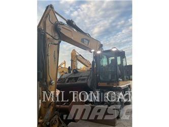 CAT M320F Excavatoare cu roti