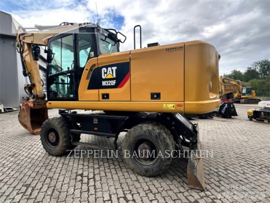 CAT M320F Excavatoare cu roti
