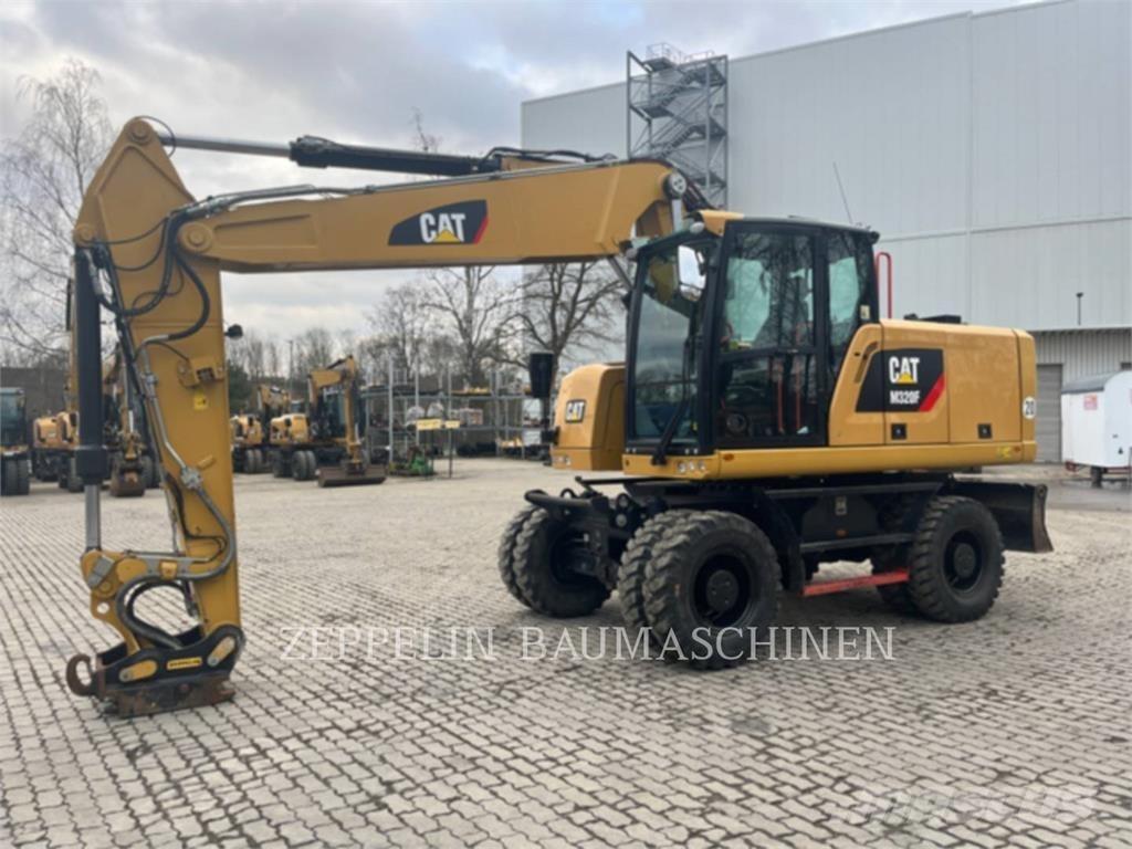 CAT M320F Excavatoare cu roti