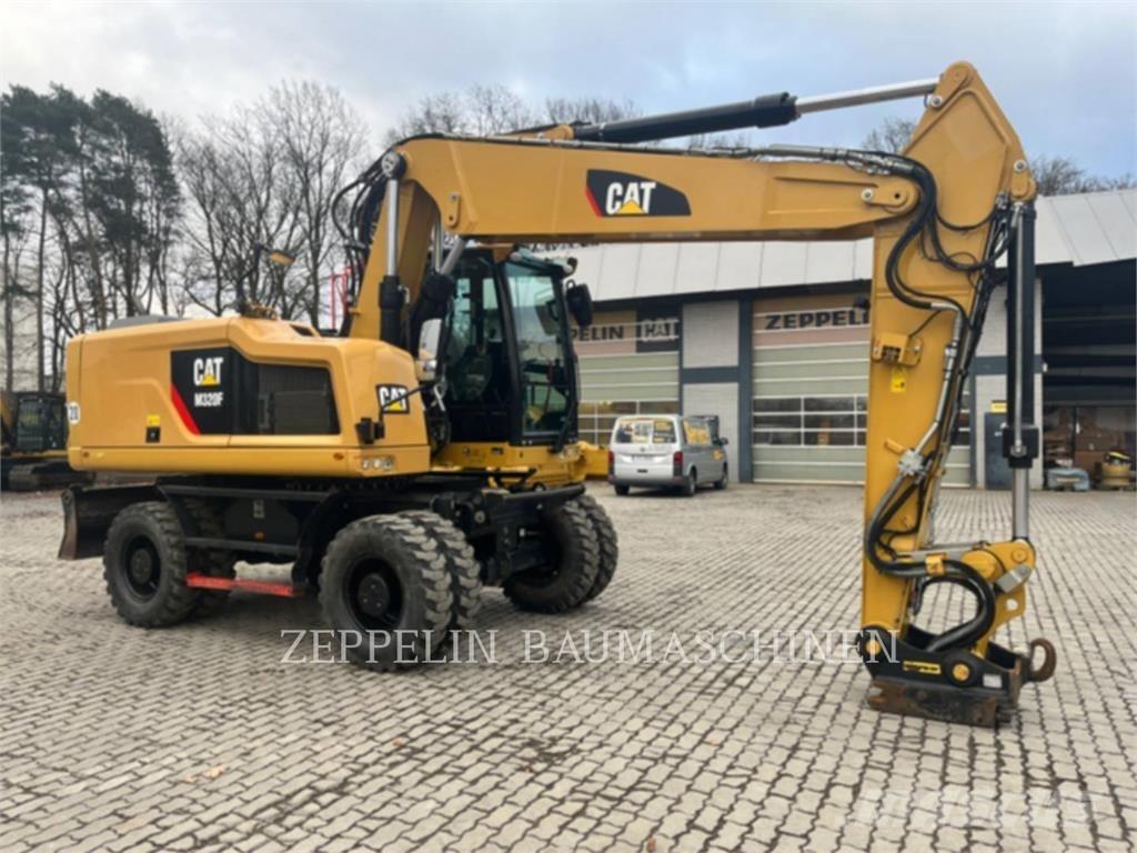 CAT M320F Excavatoare cu roti