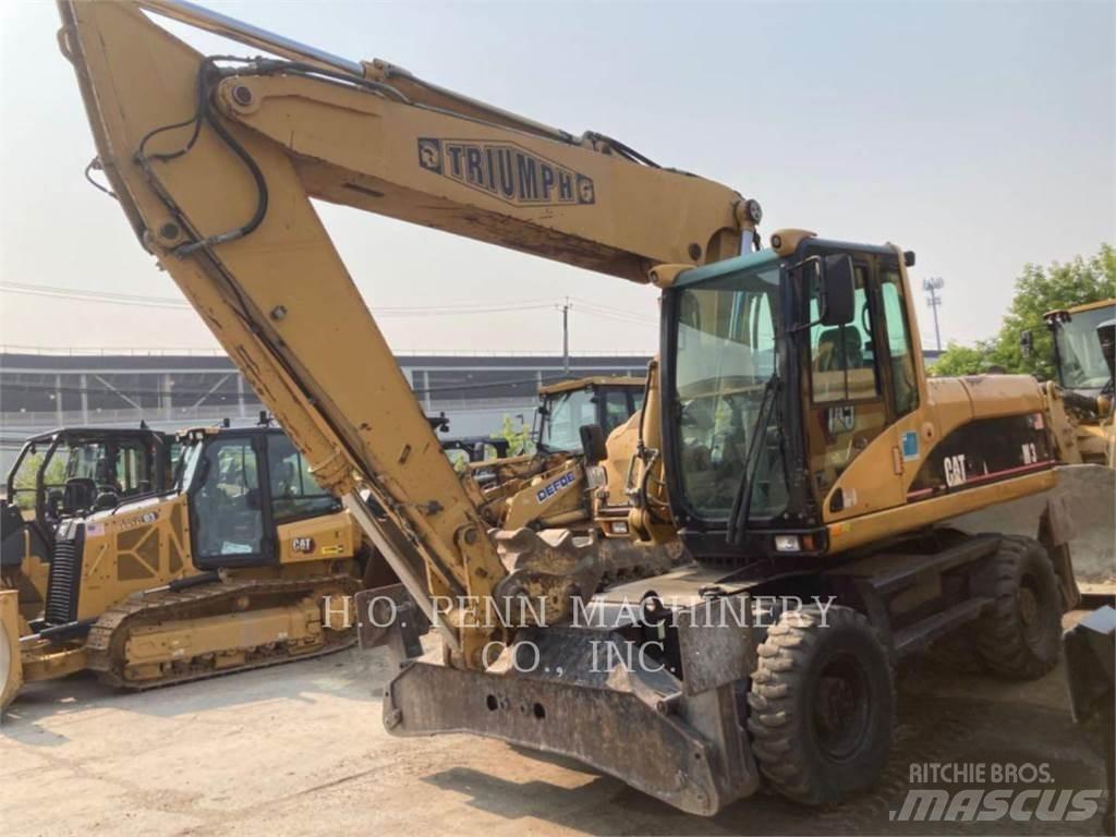 CAT M322C Excavatoare cu roti