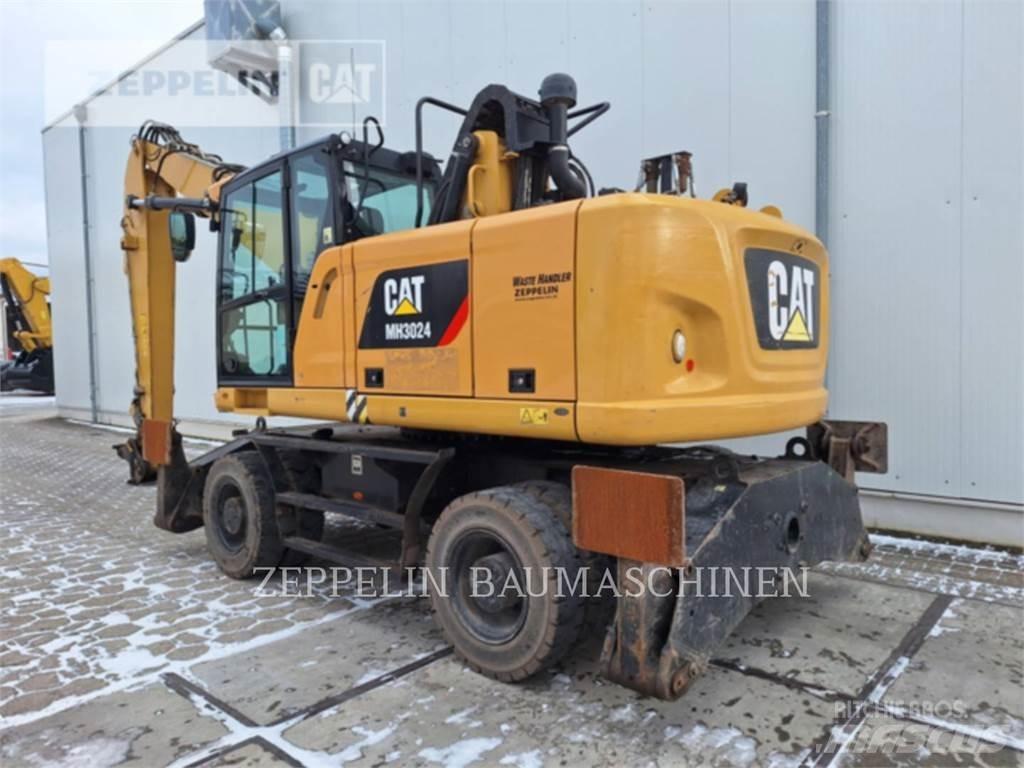 CAT MH3024-06C Excavatoare de demolare