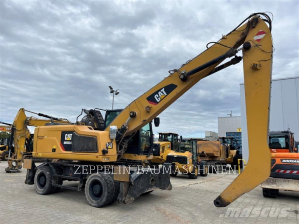 CAT MH3024-06C Excavatoare de demolare