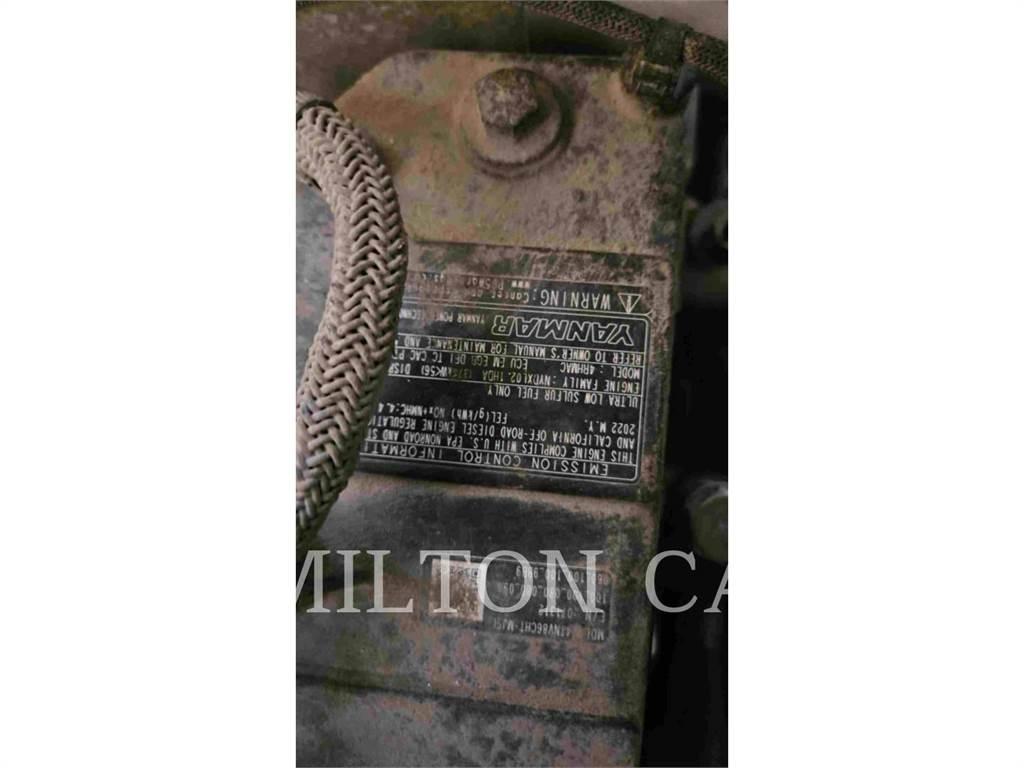 John Deere 318G Mini incarcator