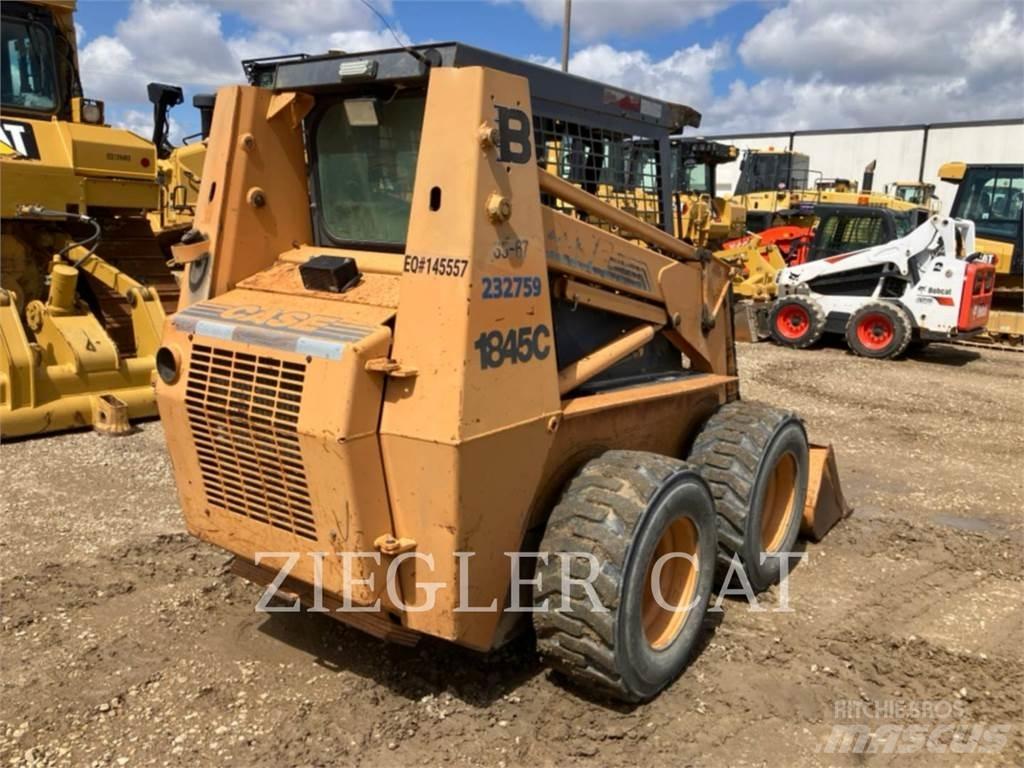 New Holland 1845 Mini incarcator
