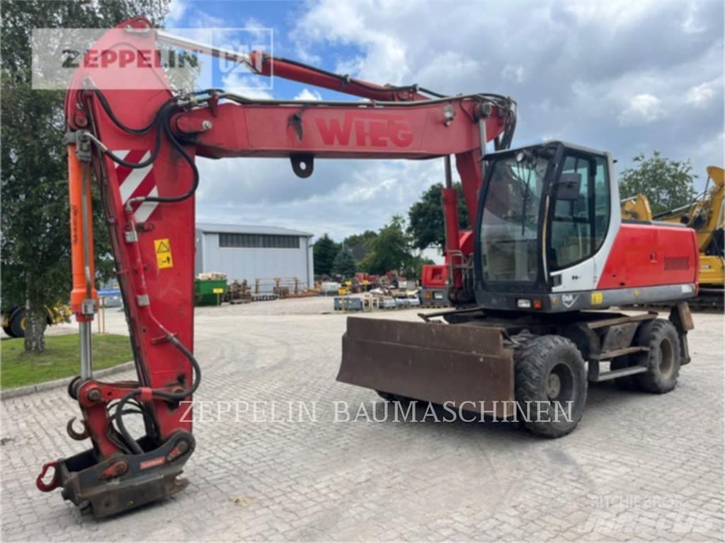 O&K MH6.6 Excavatoare cu roti