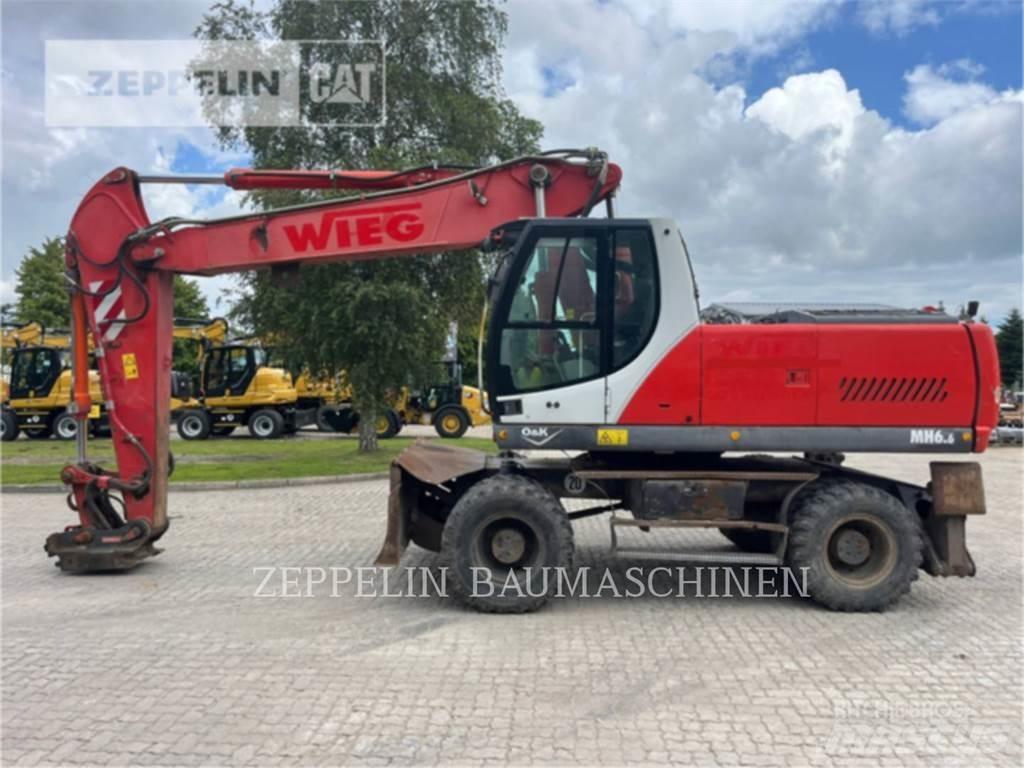 O&K MH6.6 Excavatoare cu roti