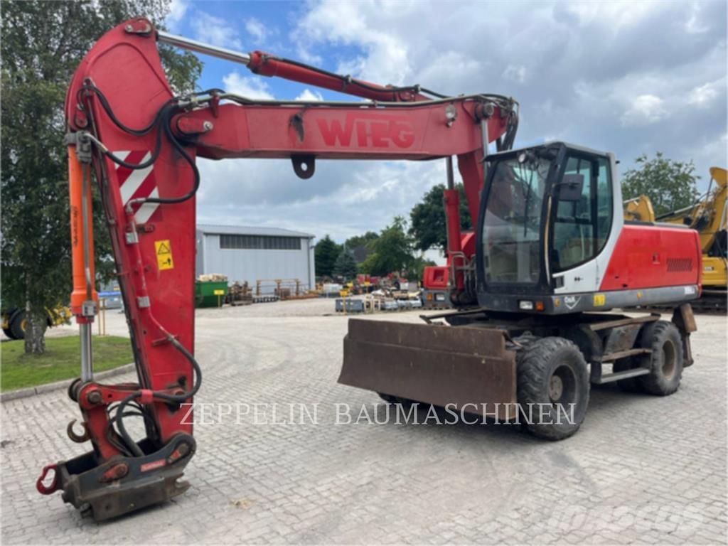 O&K MH6.6 Excavatoare cu roti