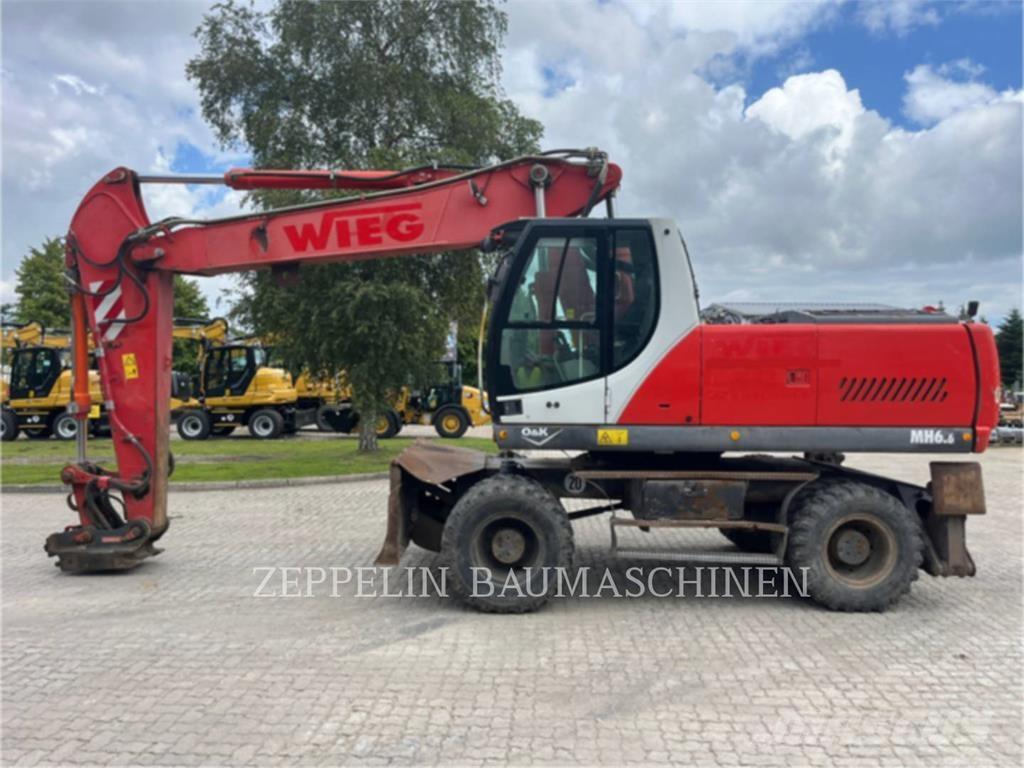 O&K MH6.6 Excavatoare cu roti