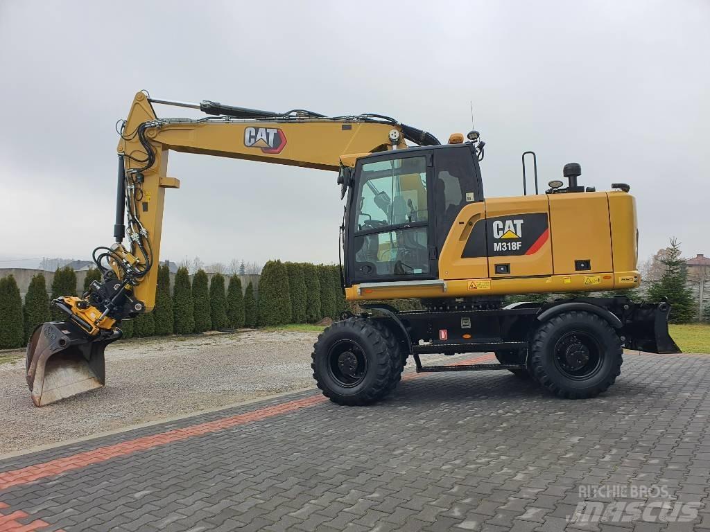 CAT M 318 F Excavatoare cu roti