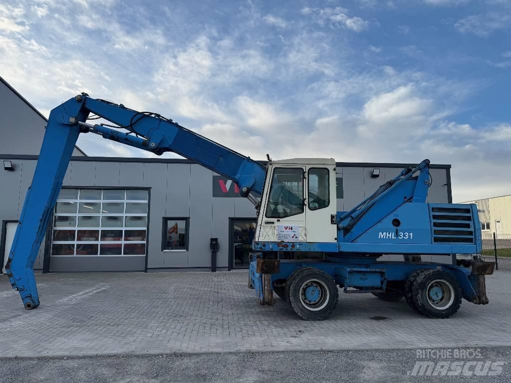 Fuchs MHL 331 Paleta de manipulare