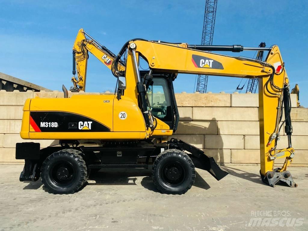 CAT M 318 D Excavatoare cu roti