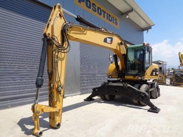 CAT M 318 D Excavatoare cu roti