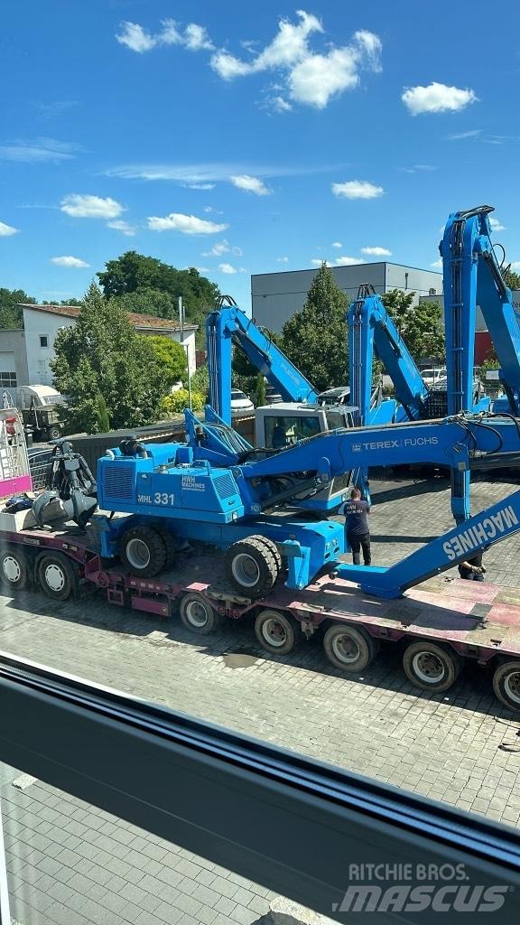 Fuchs MHL 331 C Paleta de manipulare