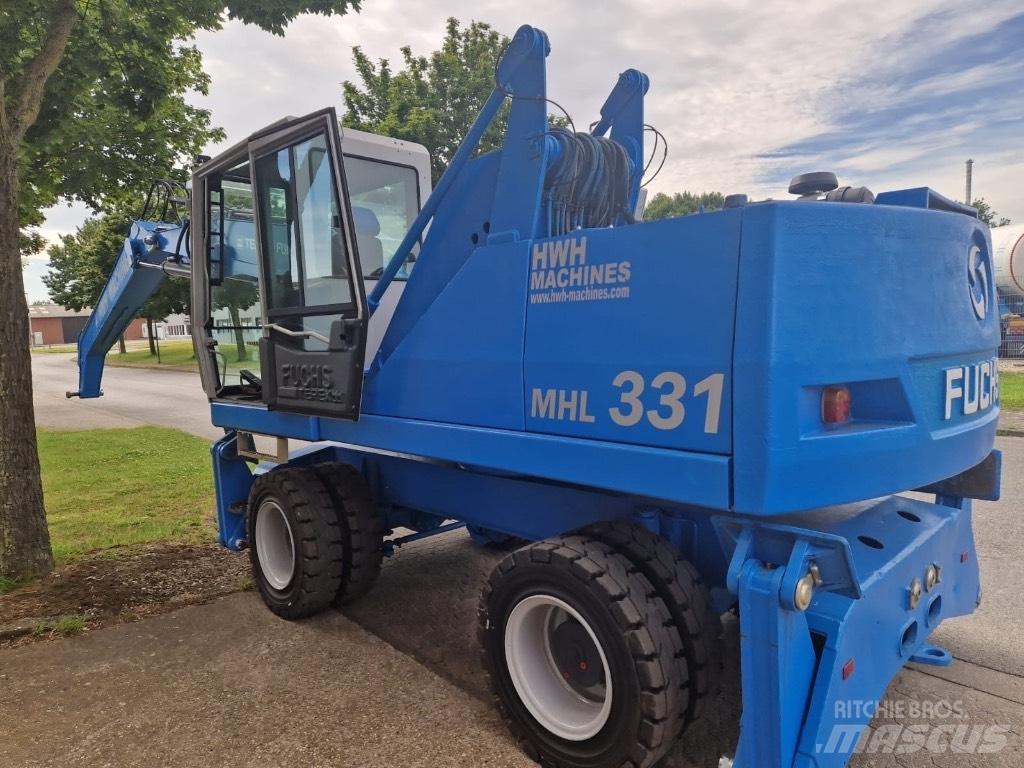 Fuchs MHL 331 C Paleta de manipulare