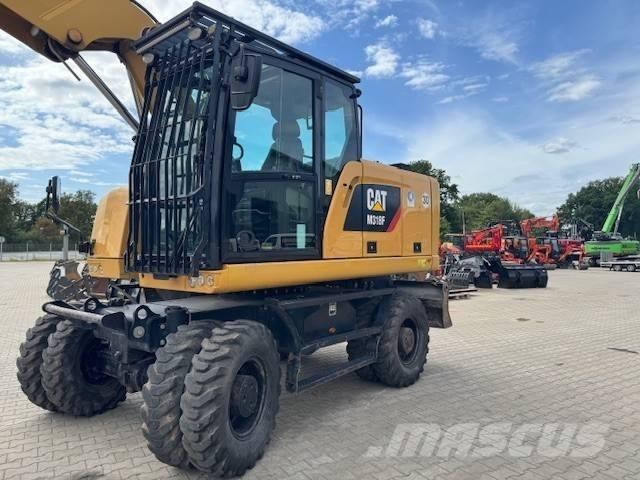CAT M 318 F Excavatoare cu roti