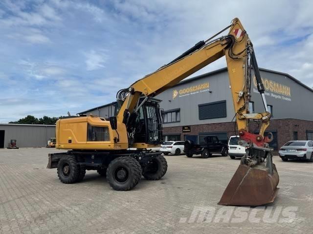 CAT M 318 F Excavatoare cu roti