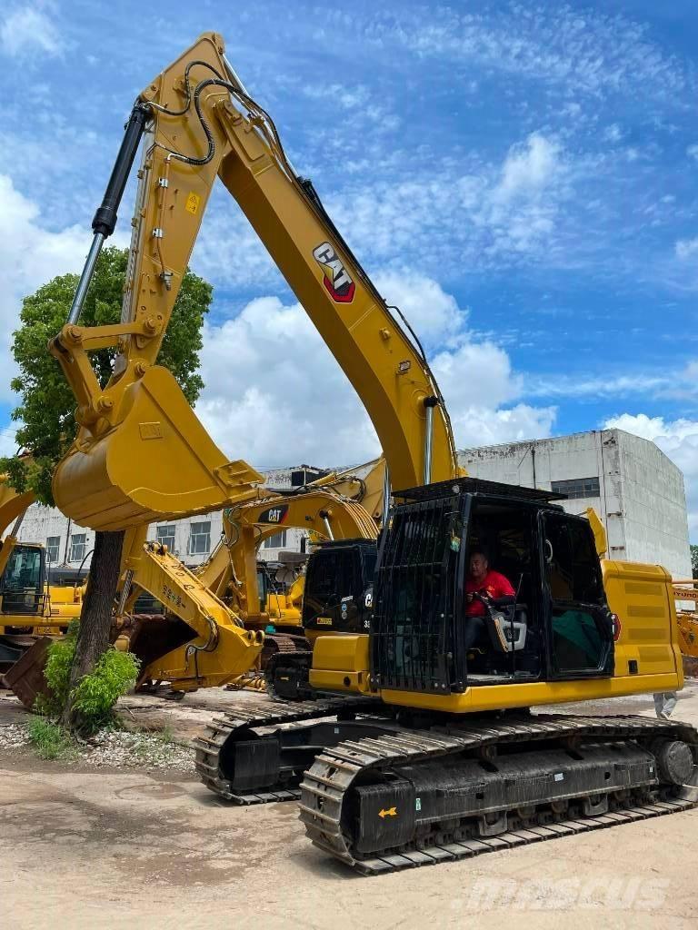 CAT 323 Excavatoare 7t - 12t