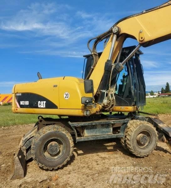 CAT M318 D Excavatoare cu roti