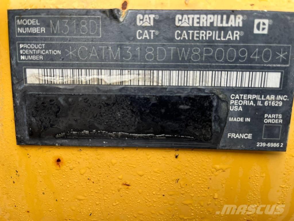 CAT M 318 D Excavatoare cu roti