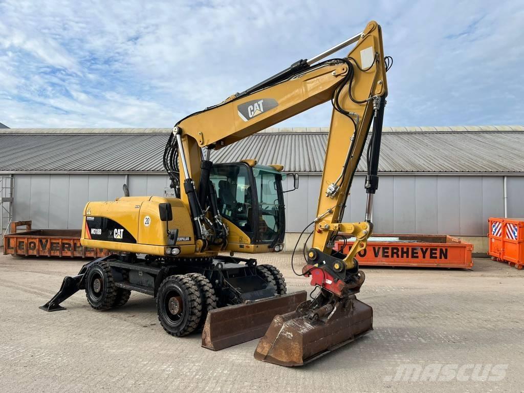 CAT M 318 D Excavatoare cu roti