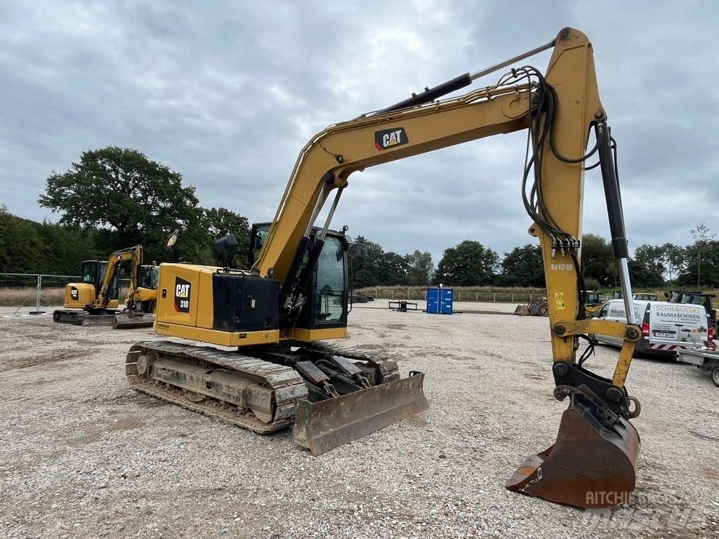 CAT 310 Excavatoare 7t - 12t