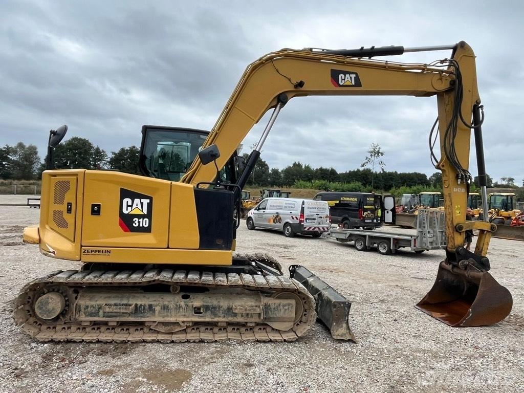 CAT 310 Excavatoare 7t - 12t